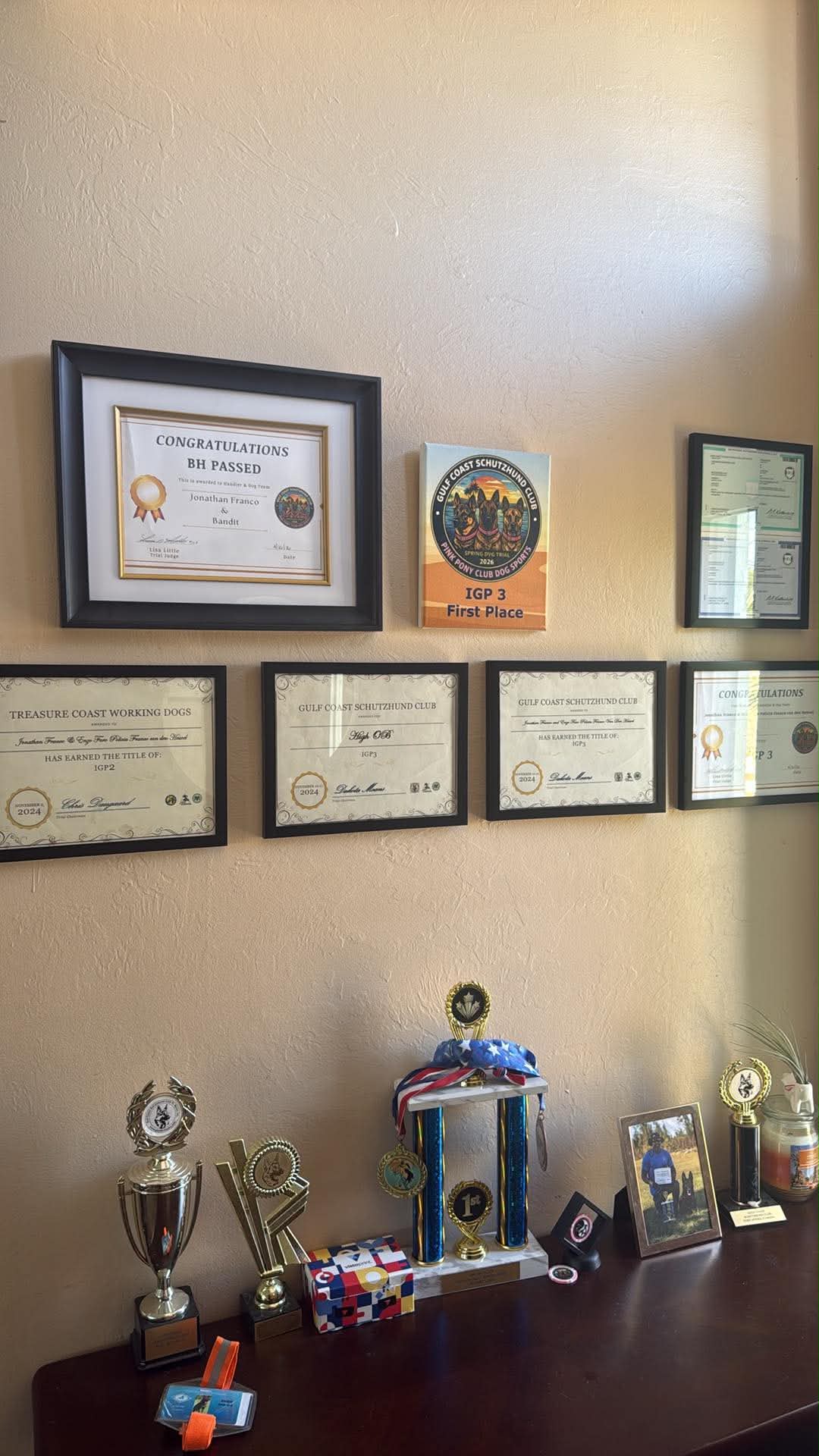 Jonathan Franco championship wall โ BH, IGP2, IGP3, High OB titles and trophies